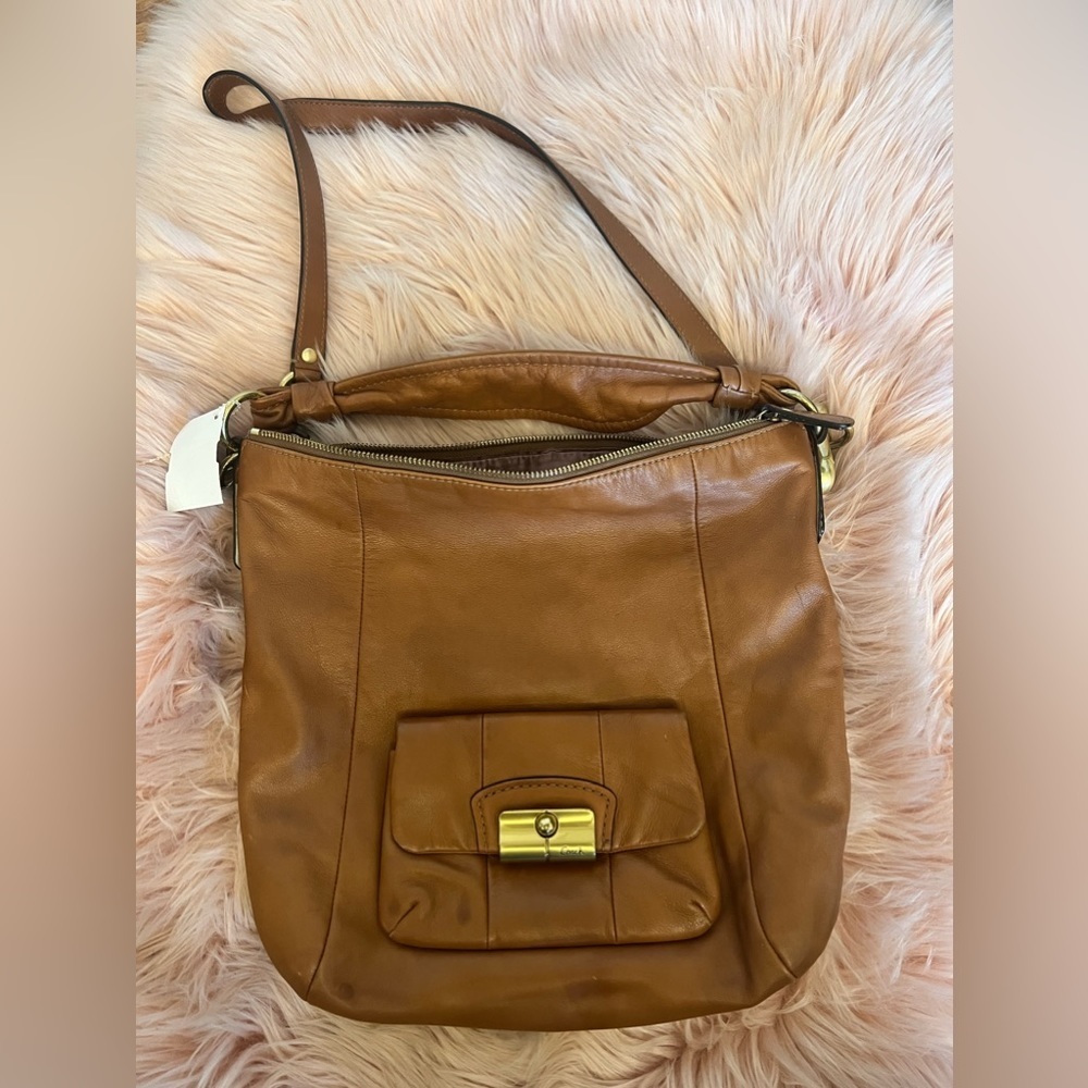 Coach Brown Leather handbag designer. Gold accents.